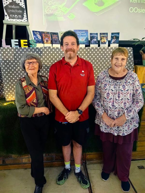 A Group of Authors Promoting Literacy at Community Kids Reading Event